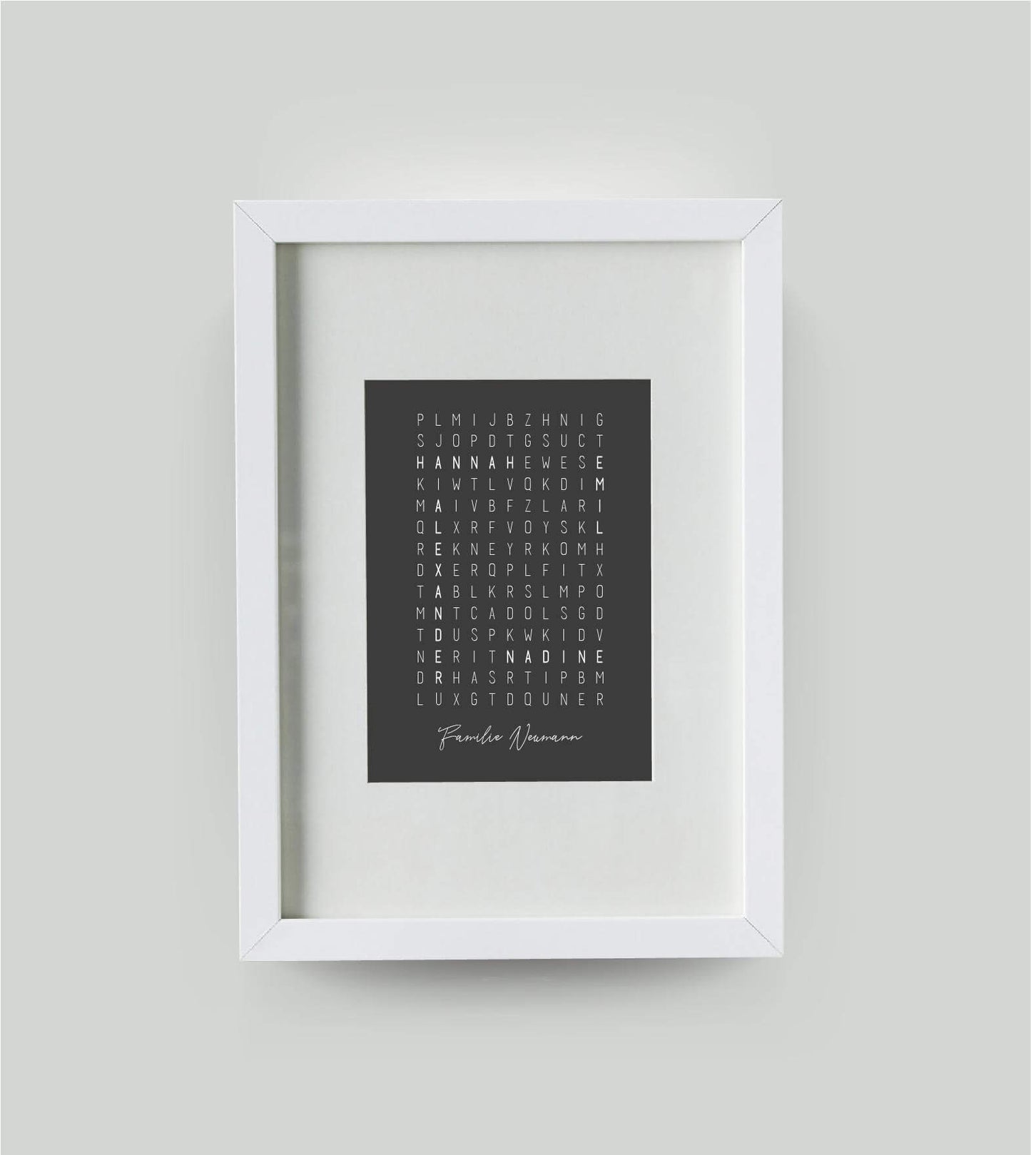 Personalisiertes Namensposter “Kreuzworträtsel”, Bildfarbe: Anthrazit/Schwarz, Bildgröße: DIN A4, Bilderrahmen: Bilderrahmen weiß mit Passepartout, Copyright: 321geschenke.de