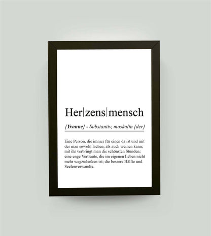 Personalisiertes Bild “Definition HERZENSMENSCH”, DIN A4, mit Rahmen schwarz 21x30cm, ohne Passepartout, Copyright: 321geschenke.de