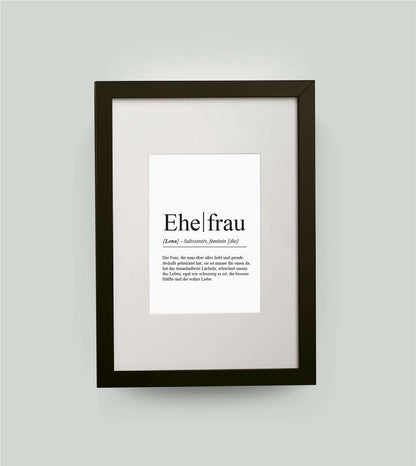 Personalisiertes Bild “Definition EHEFRAU”, DIN 13x18cm, mit Rahmen schwarz 21x30cm, ohne Passepartout, Copyright: 321geschenke.de