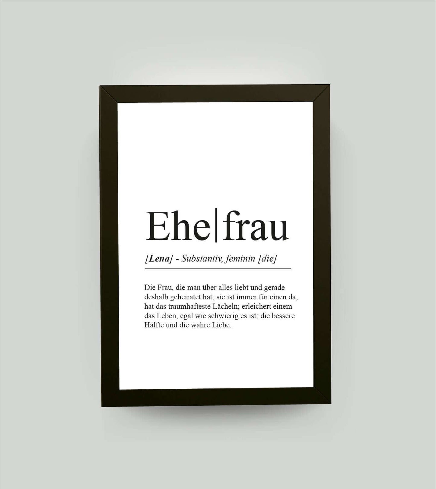 Personalisiertes Bild “Definition EHEFRAU”, DIN A4, mit Rahmen schwarz 21x30cm, ohne Passepartout, Copyright: 321geschenke.de